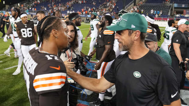 Dorian Thompson-Robinson and Aaron Rodgers after the Hall of Fame Game